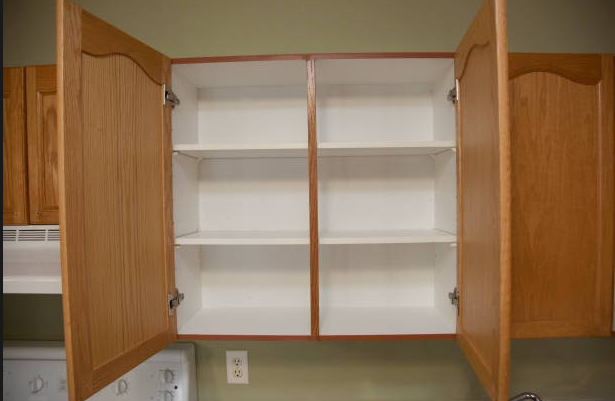 Emptying, cleaning and putting back into cabinets. Price per 1 cabinet